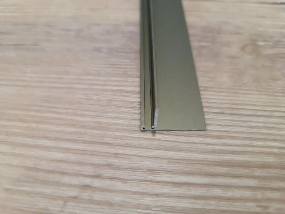 Микроплинтус micro L Laconistiq Шампань анодированный